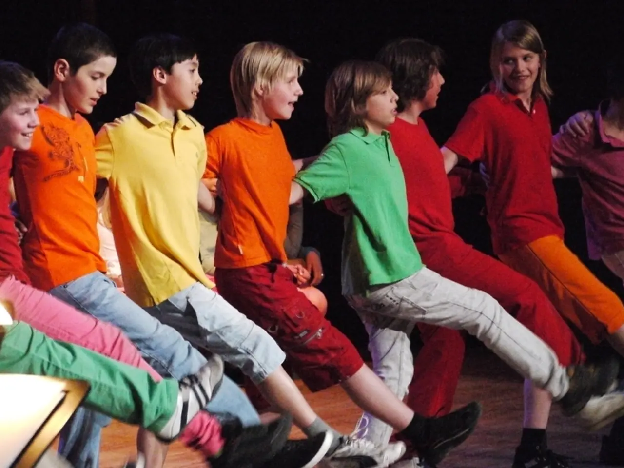This picture seems to be clicked inside the hall. In the center we can see the group of children...