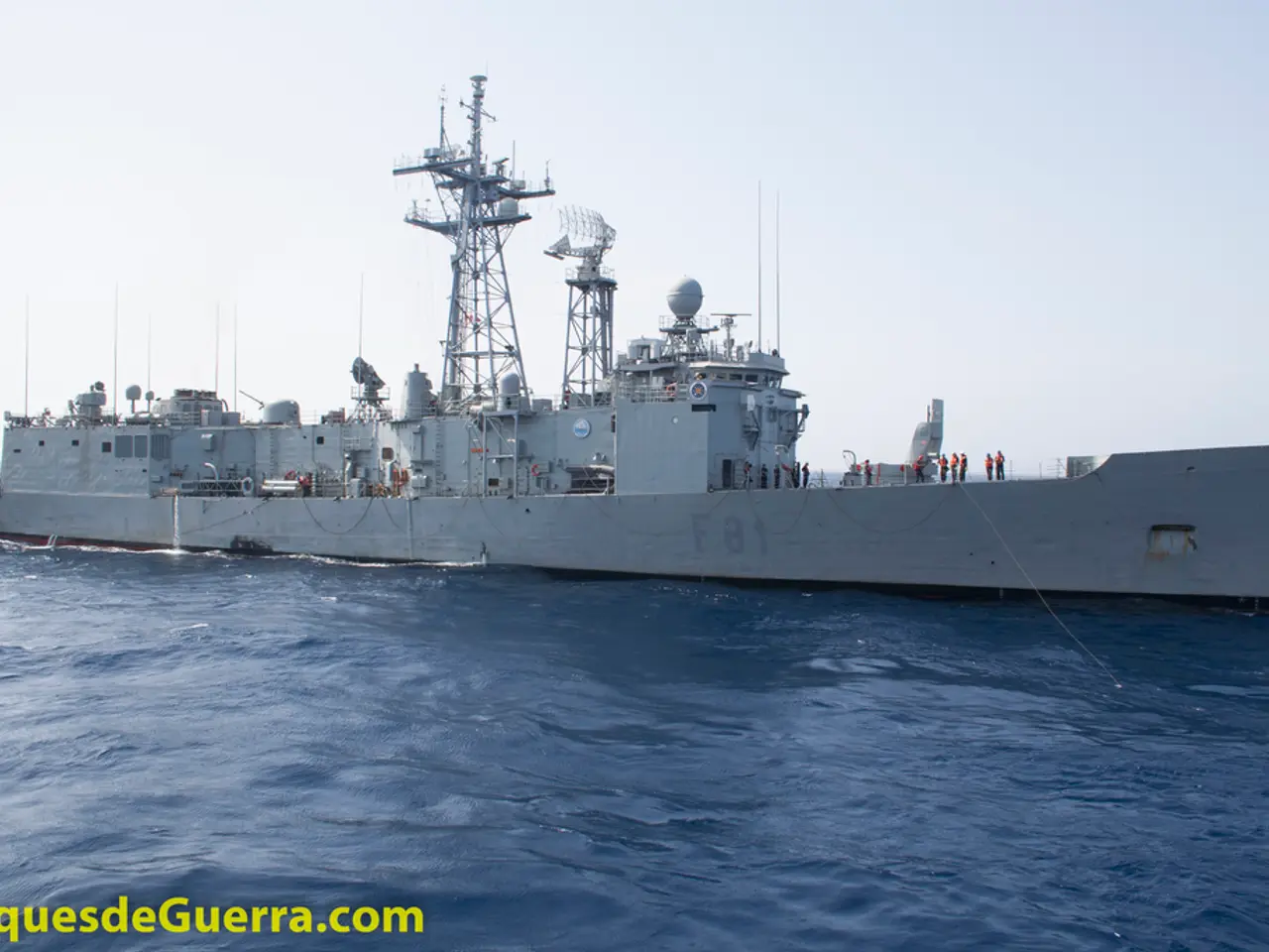 It is a very big ship which is in white color in the water and on the left side there is a website...