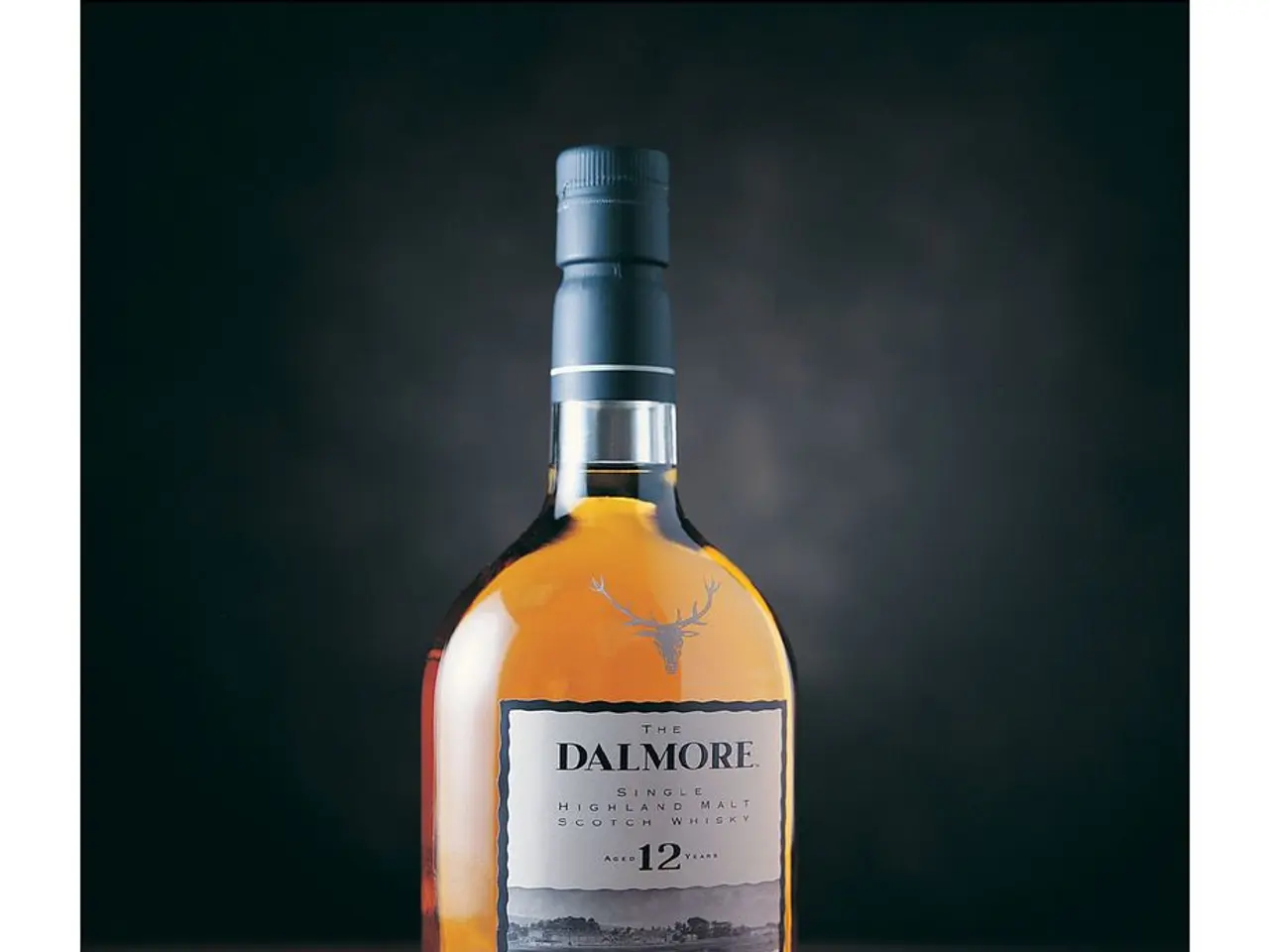 Here, we see an alcohol bottle which is placed on a table. The lid of the bottle is black in color....