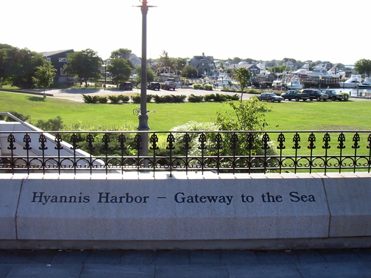 In this picture we can see the parapet wall with the grill. Behind we can see the lamppost and...