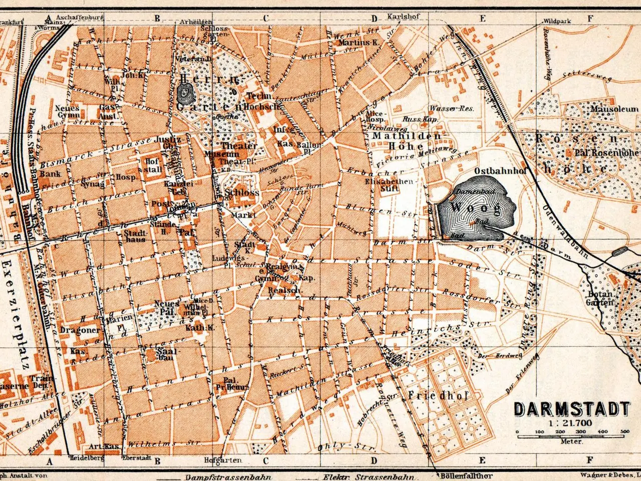 The image shows an old map of the city of Darmstadt, Germany, with text and a map of a building in...