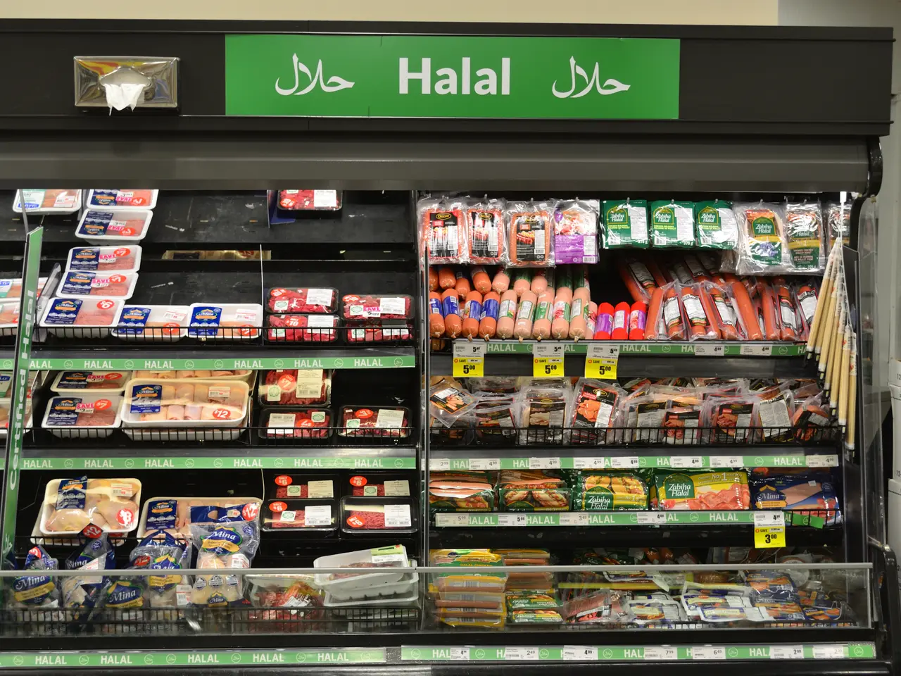 The image shows a grocery store filled with lots of different types of food, including packets,...