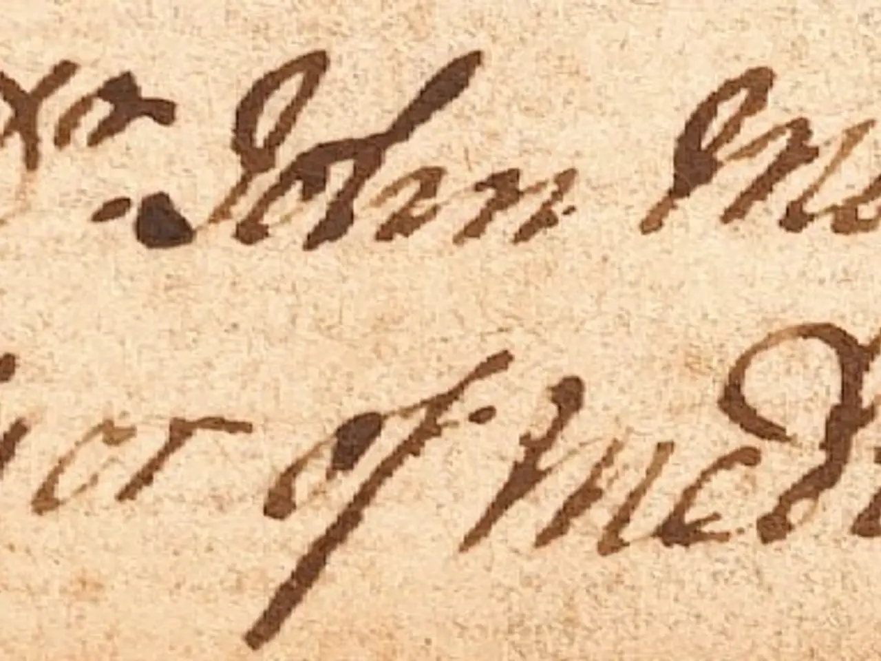 The image shows a close up of a piece of paper with handwriting on it. The paper appears to be a...