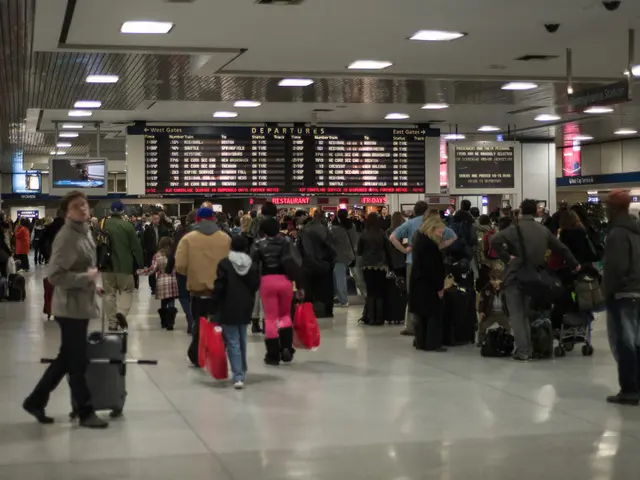 This picture might be taken in airport, in this picture there are some people who are standing and...