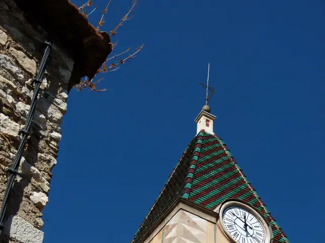 It is the construction, there is a clock in it. At the top it is the sky.