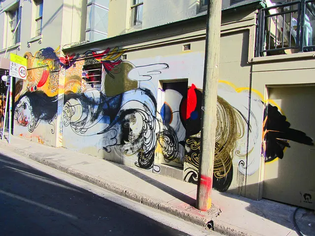 In front of the image there is a road. There are poles. There is a board with some text on it. In...