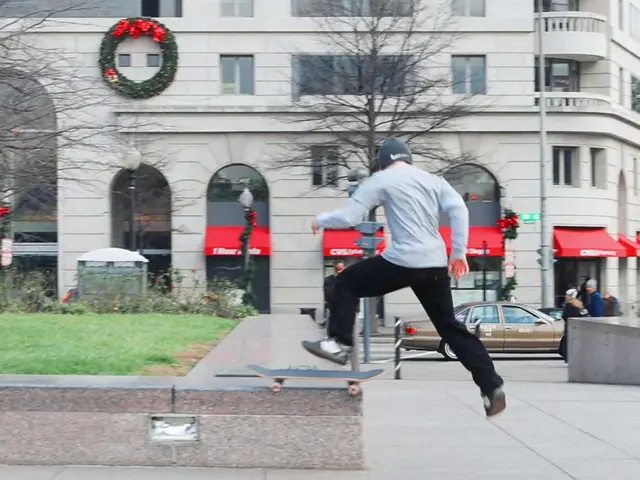 In the image we can see there is a man jumping from the roller skate board and there is ground...