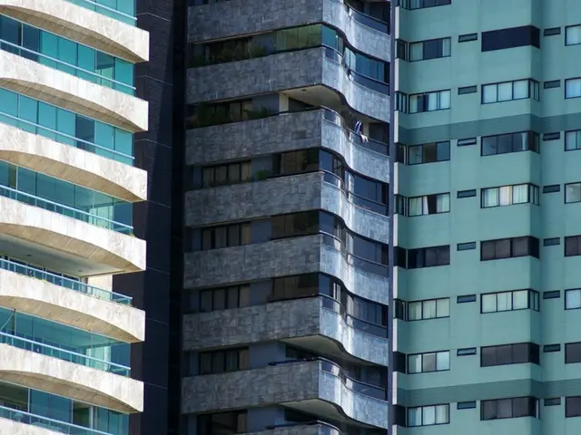 In this image there are buildings.