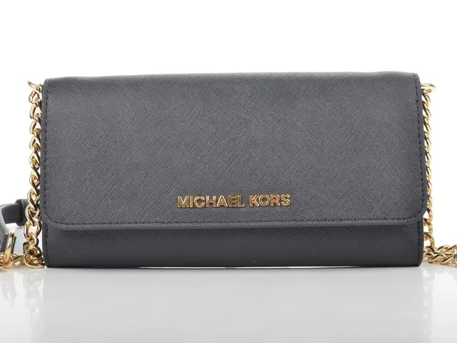 A handbag labelled Michael kors is shown in the picture.