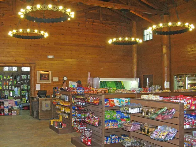 In this image we can see an inner of the store which is made of wood. Some food items and other...