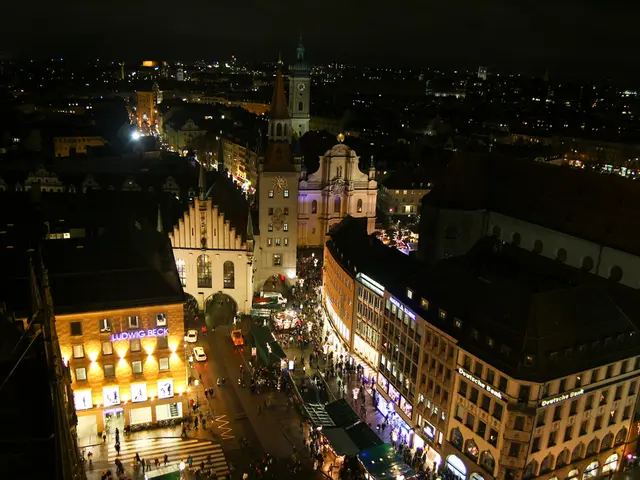 The picture is captured from the top view of a city, there are many buildings and houses and in...