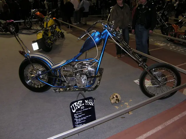 In front of the image there are motorbikes inside the fencing. And there is a skull and a poster...