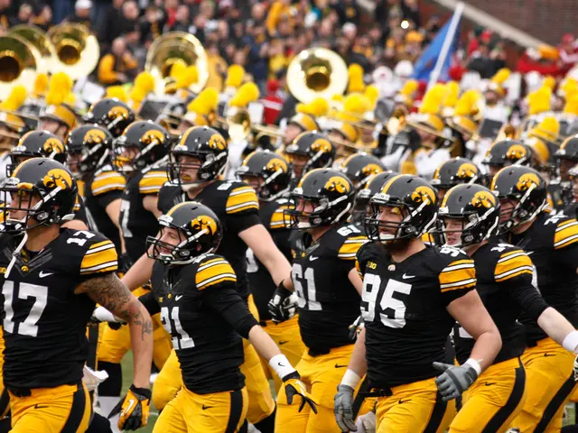 In this image I can see group of people walking they are wearing black and yellow color dress, and...