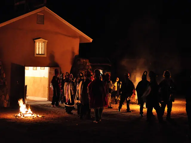 This picture is taken during night and I can see a house and in front of the house I can see few...