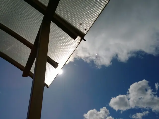 In this image we can see the roof which is covered with the asbestos sheets. At the top there is...