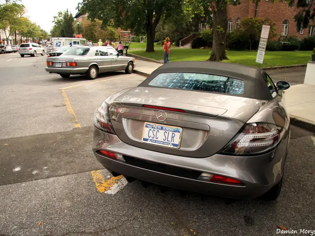 In this image, on the foreground there is a Mercedes car and in the background there is a sky.