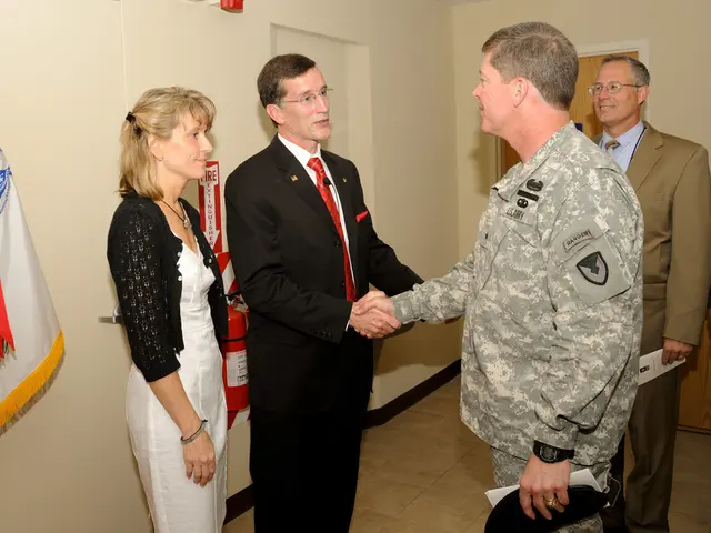 In the image in the center we can see few people were standing and they were smiling,which we can...