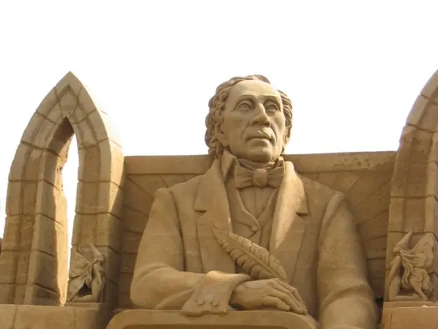 In this image there are some sculptures and a wall, and in the center there is some text.