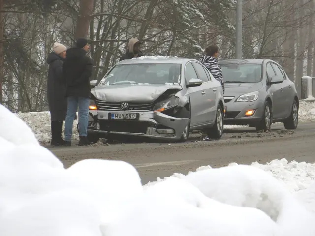 The image shows a car that has been involved in a crash on the side of the road, surrounded by...