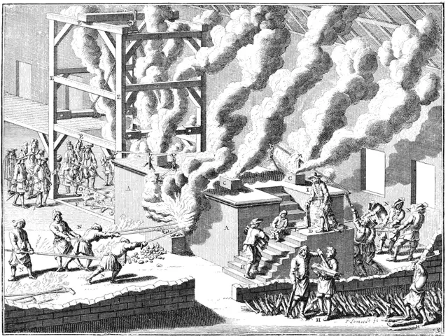 The image shows a black and white engraving of a factory with smoke billowing out of it. There are...