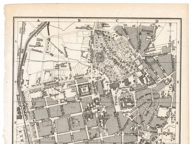 The image shows an old map of the city of Darmstadt, Germany, with text written on it. The map is...