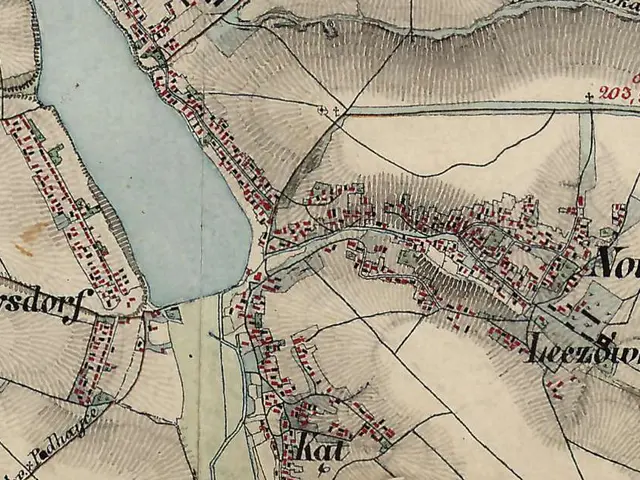 The image shows an old map of the city of Novosibirsk, Russia, with a river running through it. The...