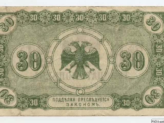 The image shows an old Russian banknote with a picture of a double-headed eagle on it. The...
