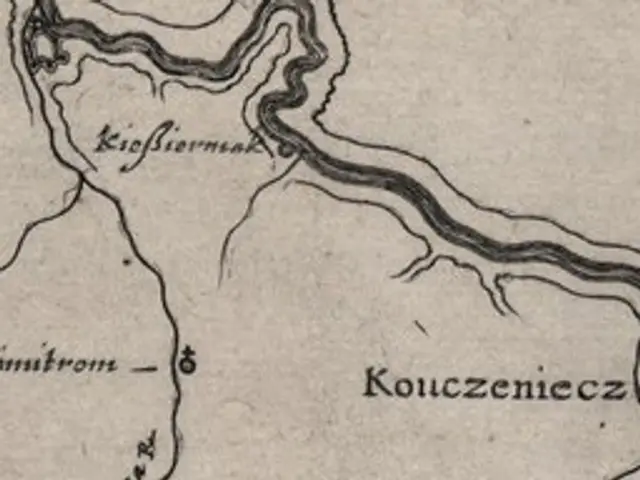 The image shows an old map of the city of Koczeniecz, Poland, with text written on it. The map is...