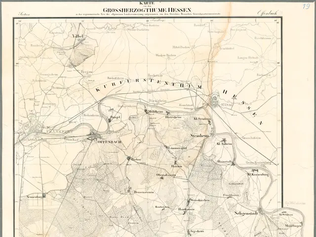 The image shows an old map of the city of Hessen, Germany, with black borders and text written on...