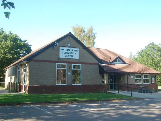 The image shows a house with a roof, windows, a signboard with some text on it, a metal fence, a...