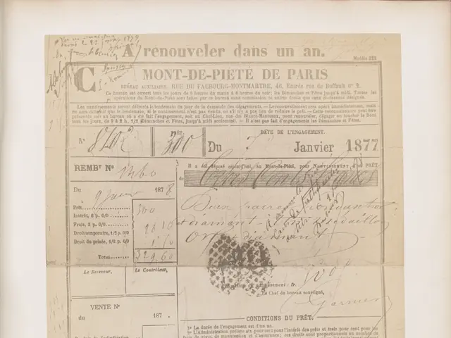 The image shows an old document with a black and white image of a man's face on it. The document...