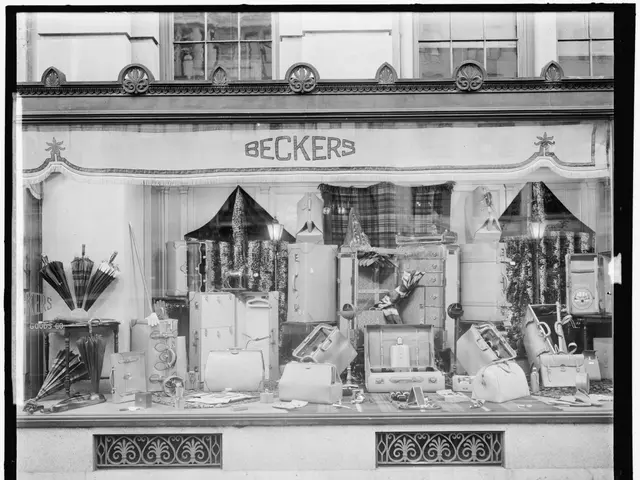 The image shows a black and white photo of a store window with a sign that reads "Beckers". Inside...
