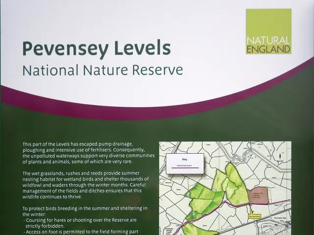 The image shows a poster with text and a map of the Pevensey Levels National Nature Reserve. The...