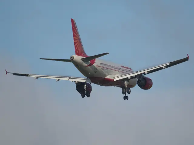 The image shows an Air India plane flying in the sky with its landing gear down, its wings spread...