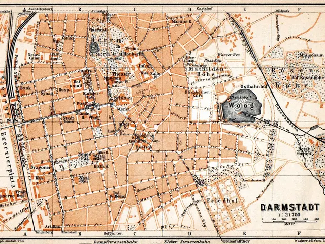 The image shows an old map of the city of Darmstadt, Germany, with text and a map of a building in...