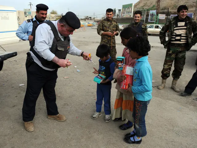 The image shows a group of people standing on the ground, some of them holding objects in their...