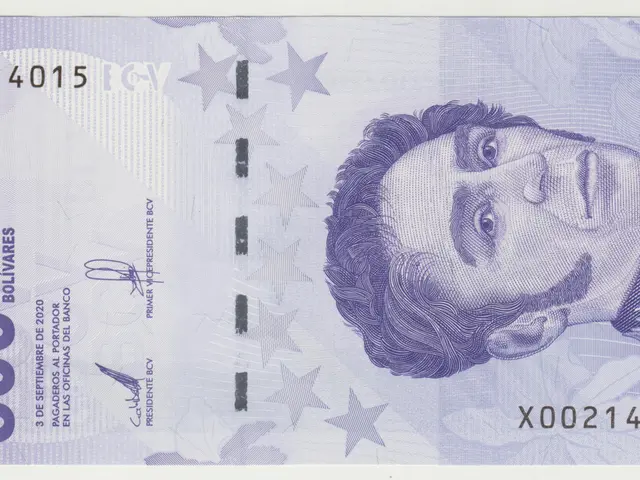 The image shows a 500 mil bolivariana banknote with a portrait of a man on it. The man in the...