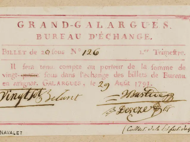 The image shows a paper with text written on it, which reads "Grand-Galargues Bureau d'Change -...