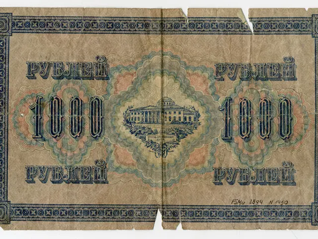 The image shows an old Russian banknote with a picture of a building on it against a white...