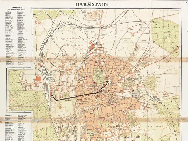 The image shows an old map of the city of Darmstadt, Germany. It is a detailed map with streets,...