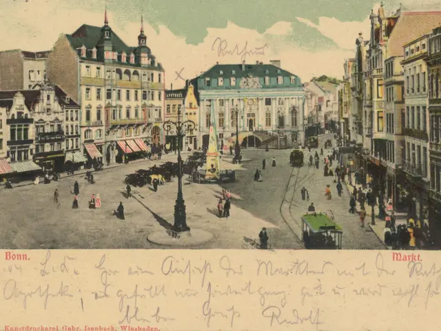 The image shows an old postcard of a city street with people walking around, buildings with...