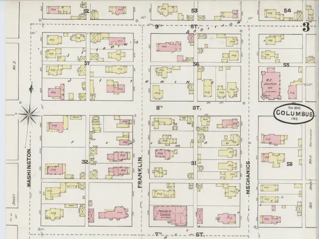 The image shows an old map of the city of Columbus, Ohio, with buildings and text written on it....
