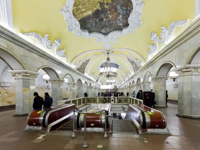 The image shows a subway station in Moscow, Russia, with people walking on the floor, escalators,...