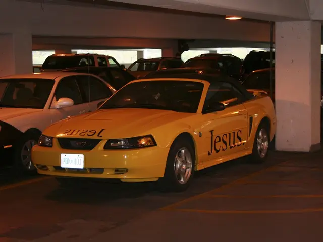 This is the parking area of a building where we can see so many cars are parked.