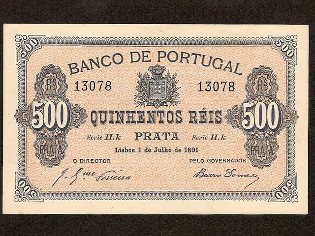 The image shows an old banknote from Portugal with a black background. The paper has text, numbers,...
