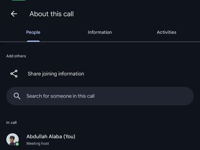 The image shows a screenshot of a cell phone with a group of people on the screen, along with text...