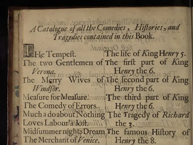 The image shows an open book with a black background and text on it. The book appears to be a...