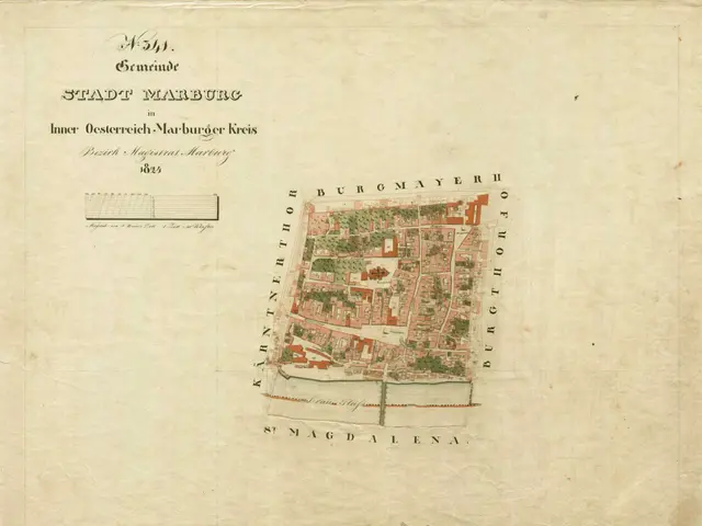 The image shows an old map of the city of Stadt Marburg, with text written on it. The map is...