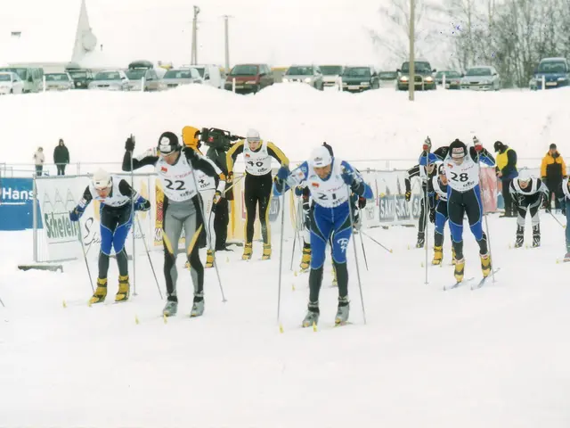 The image shows a group of people wearing helmets, goggles, gloves, and shoes, holding ski poles,...