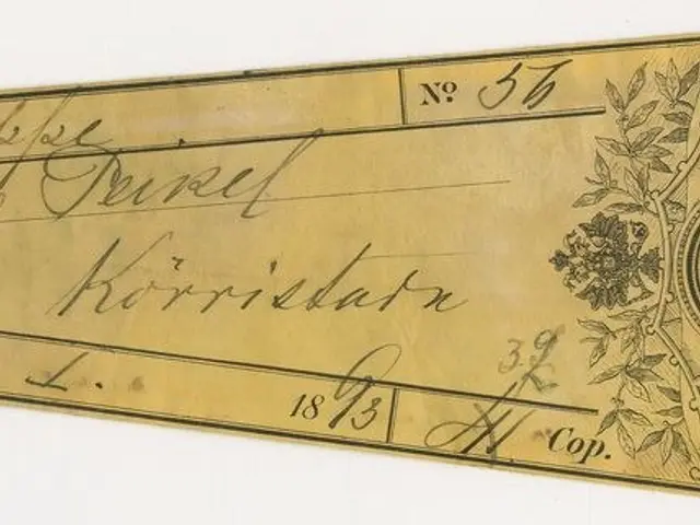 The image shows an old gold check with a picture of a man on it, which is believed to be a banknote...